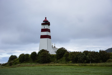 Alnes Lighthouse ,old and famous building ,established in 1852 to guide fishing boats  to the...