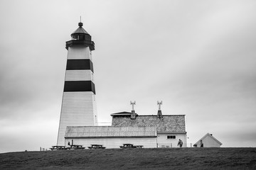Alnes Lighthouse ,old and famous building ,established in 1852 to guide fishing boats  to the...
