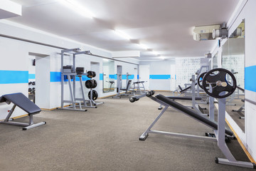 Fototapeta na wymiar Gym interior with sports equipment.