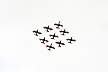 Aeronautical Patrol.Tricolor arrows. Military Team. Airforce. Formation. Airshow. Diamond aeronautical formation. Rhombus.
