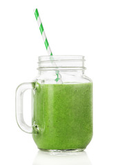 Green smoothies in a glass jar