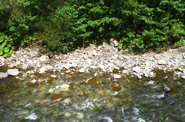 Spring water mountain river and the nice stony creek on North Caucasus. mountain natural landscape photo