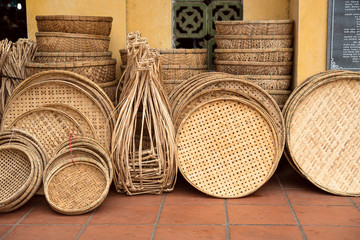 Asian bamboo and wicker baskets for sale at market in Hoi An, Vietnam