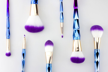 Flat lay ombre unicorn color brush set © billyandfriends
