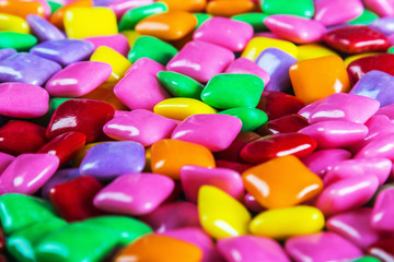 Fototapeta na wymiar chewing gum of different colors. background of chewing gum