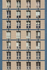 Windows of a high-rise, multi-storey building, texture, background, close-up