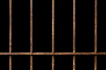 Old prison rusted metal bars cell lock on black background, concept of strengthen and protect