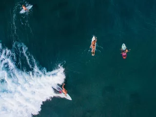 Fototapeten Bali surfer canggu bali aerial shot paddle surf  © Tim