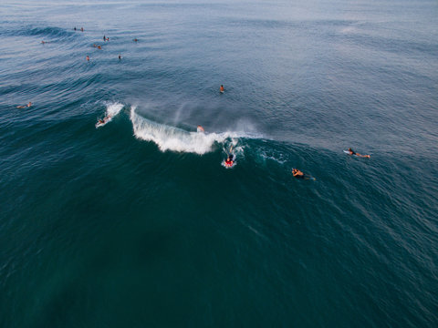 surfer canggu bali aerial shot