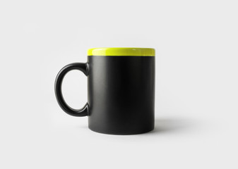 Blank black mug for coffee or tea. Cup mock-up. Responsive design mockup.