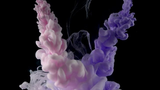 Color drop underwater creating a silk drapery. Ink swirling underwater