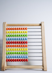 Abacus shows concept of traditional counting, calculation, mathematics, accounting, and finance.