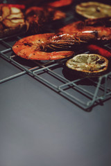 Fresh grilled prawn shrimps on grey background