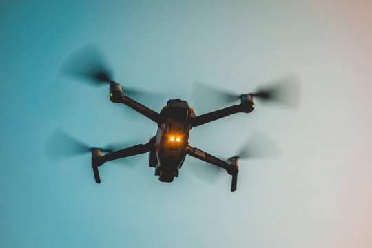 darken drone on blue warm background