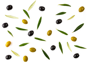 Texture background with green and black olives and with olive leaves. Isolated on white background.