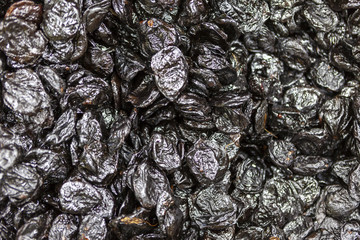 Prune texture in shop close up.