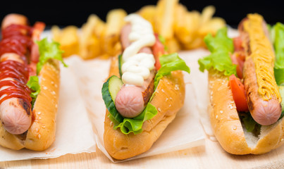 Assorted hot dogs with different dressings