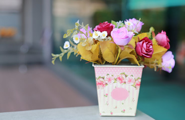 Flower bouquet of artificial roses.