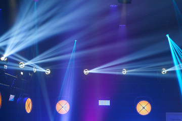 Light rays on the stage. Image of the bright colorful "Prolight + Sound NAMM 2018@ event in Moscow