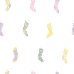 Seamless repeat pattern with Christmas stockings, on a white background. Hand drawn vector illustration. Flat style design. Concept for Christmas textile print, wallpaper, wrapping paper.