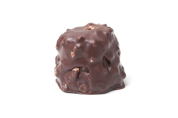 closeup of milk chocolate in shaped rock on white background