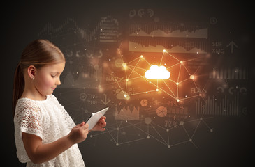 Adorable girl working on tablet with cloud technology concept
