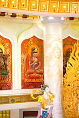 the Centre of Buddhism in Sanya. Temple with Lotus on the ceiling, Golden Buddha and many statues...