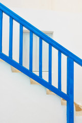 Blue staircase with railing