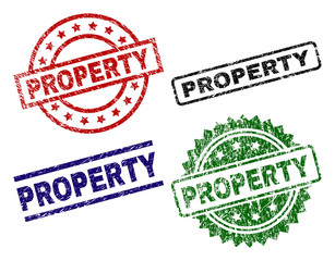 PROPERTY seal prints with corroded style. Black, green,red,blue vector rubber prints of PROPERTY title with scratched texture. Rubber seals with round, rectangle, rosette shapes.