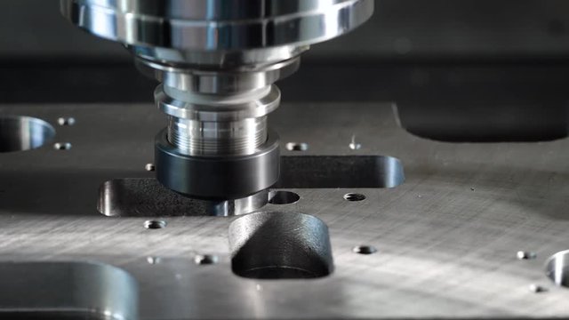 Close-up shot of a milling cutting machine in process.