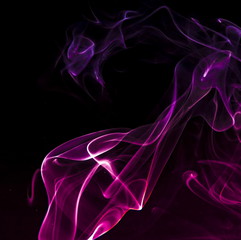 Colored smoke on black background