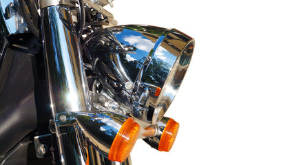 Fototapeta na wymiar Motorcycle. close-up on its front part: reflector and blinkers.