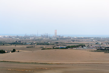 Landscape view of the city of Gela in Sicily (Italy) with its huge petrochemical refinery visible...
