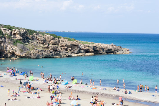 Natural reserve of Vendicari, in Sicily(Italy) near Syracuse, august 2018. In this shot the famous and beautiful Calamosche beach, as usual in summer days is full of tourists