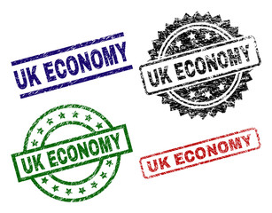 UK ECONOMY seal prints with distress surface. Black, green,red,blue vector rubber prints of UK ECONOMY text with scratched surface. Rubber seals with circle, rectangle, medal shapes.