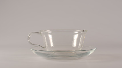 Empty Glass after a tea on a white background