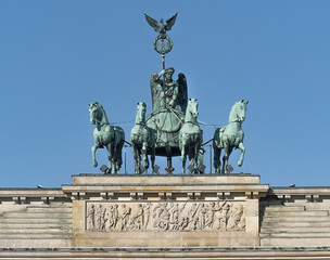 Quadriga on top of Brandenburg Gate in clear blue sky