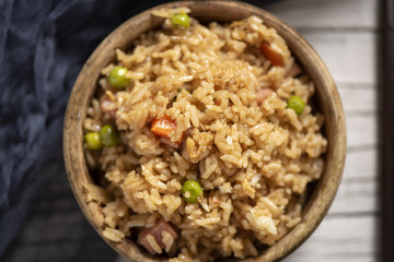 Chinese fried rice in a boxwood bowl