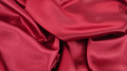 Fototapeta premium Crimson satin, drapery, textile background