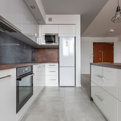 White kitchen with granite worktop