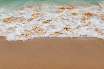 soft wave on a sandy beach