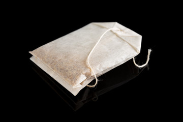 teabag on a black background