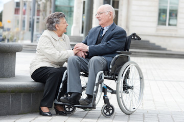 senior couple in wheelchair