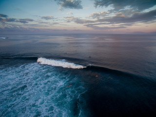 aerial shot leaky peak drone a-frame sumbawa surf ocean horizon