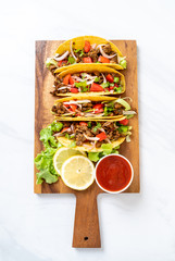 tacos with meat and vegetables