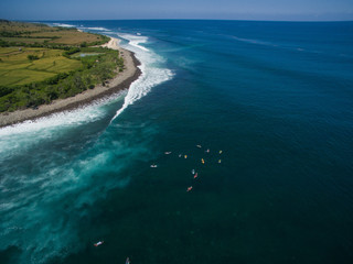 Fototapeta na wymiar leaky peak perfection left hander cobblestone surfers drone aerial view sumbawa