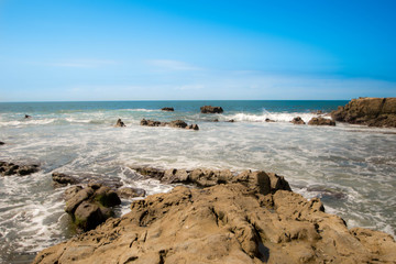 Laguna beach, waves clashing onto rocks