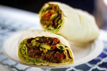 two burritos on a plate