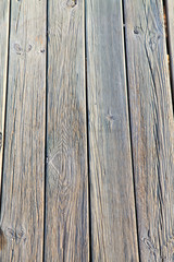 Close up off texture of weathered wooden boardwalk planks