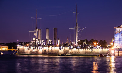 Ship Aurora in St. Petersburg, Russia, at night in June. The Neva River in St. Petersburg. Night...